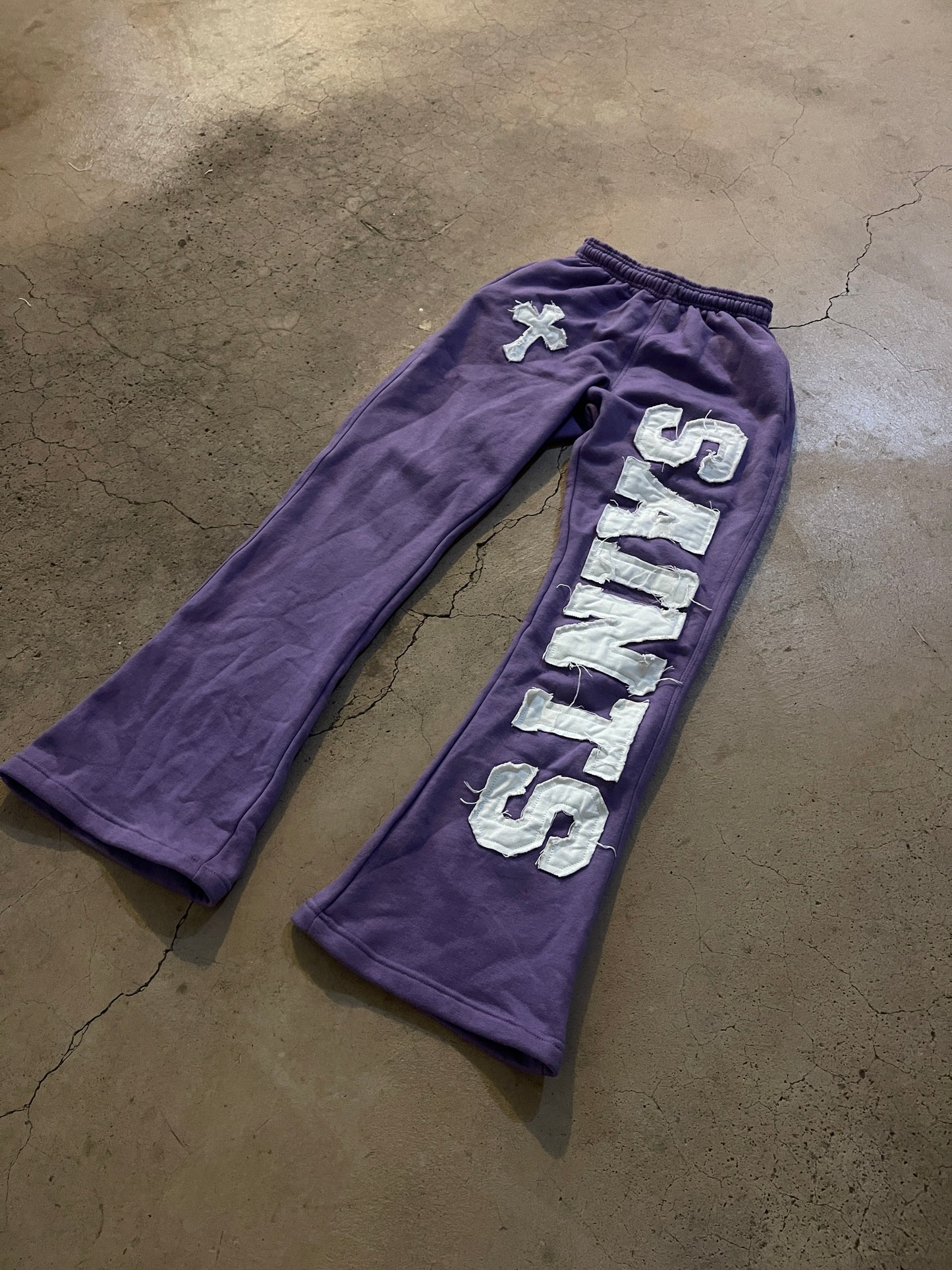 PURPLE “SAINTS” FLARED SWEATPANTS