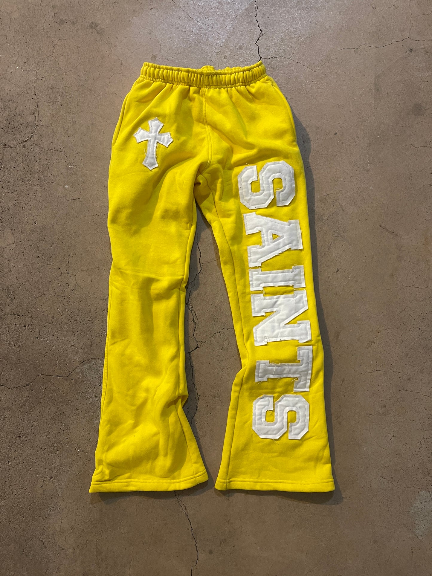 YELLOW “SAINTS” FLARED SWEATPANTS