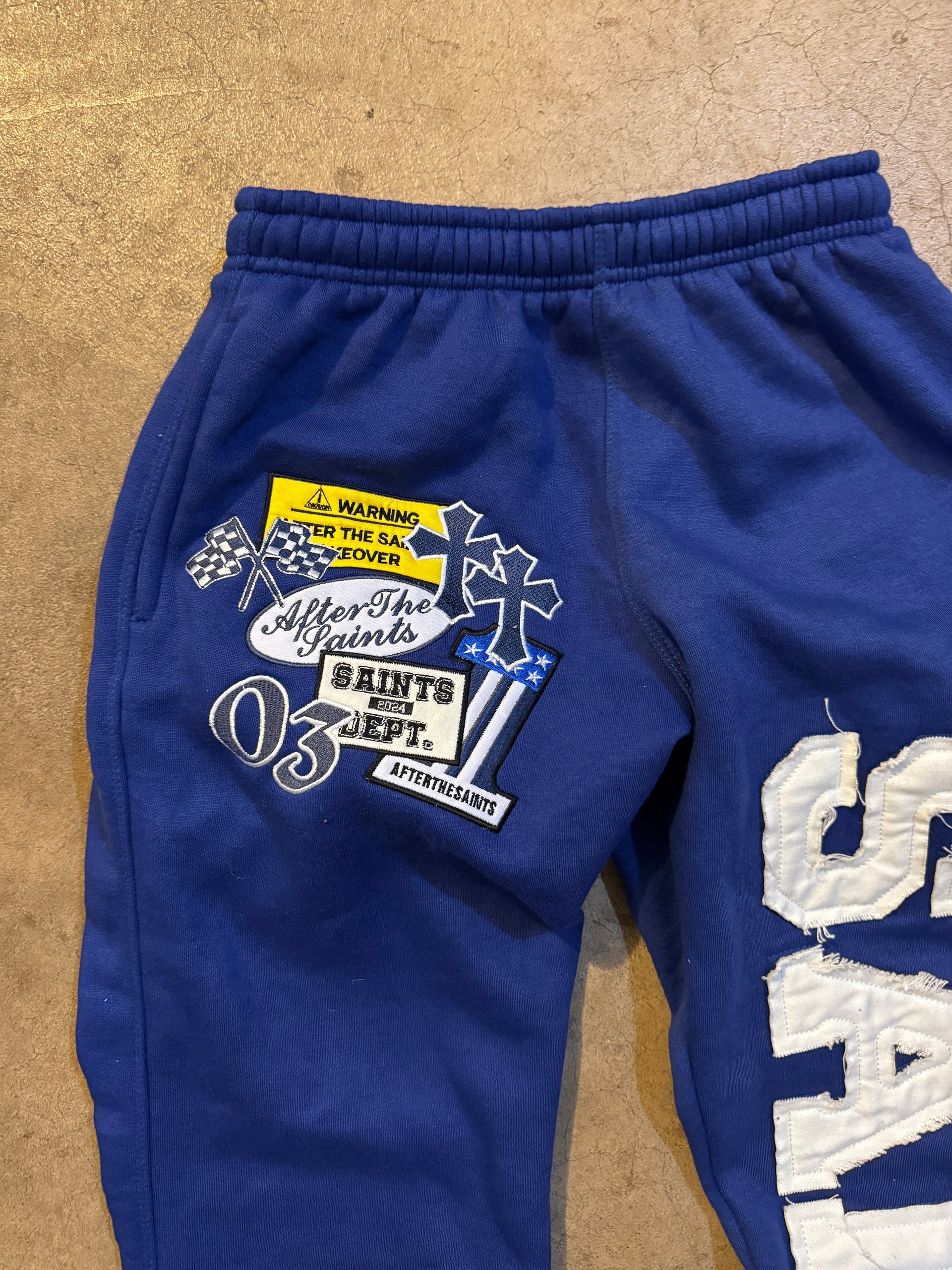 PATCHWORK BLUE SWEATS