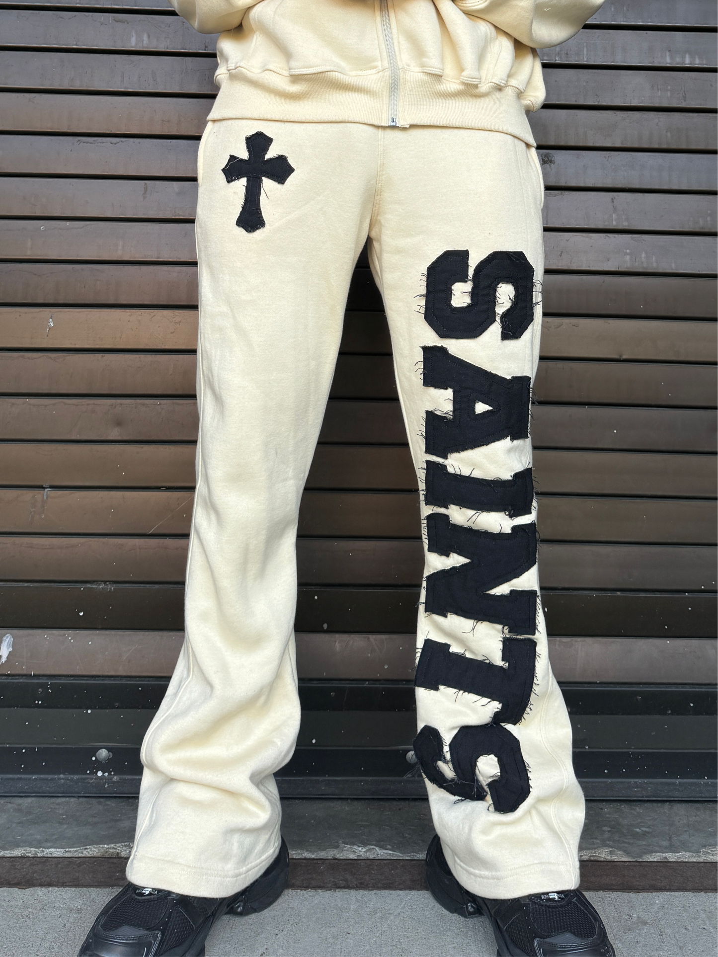 CREAM x BLACK LETTER "SAINTS" FLARED SWEATS