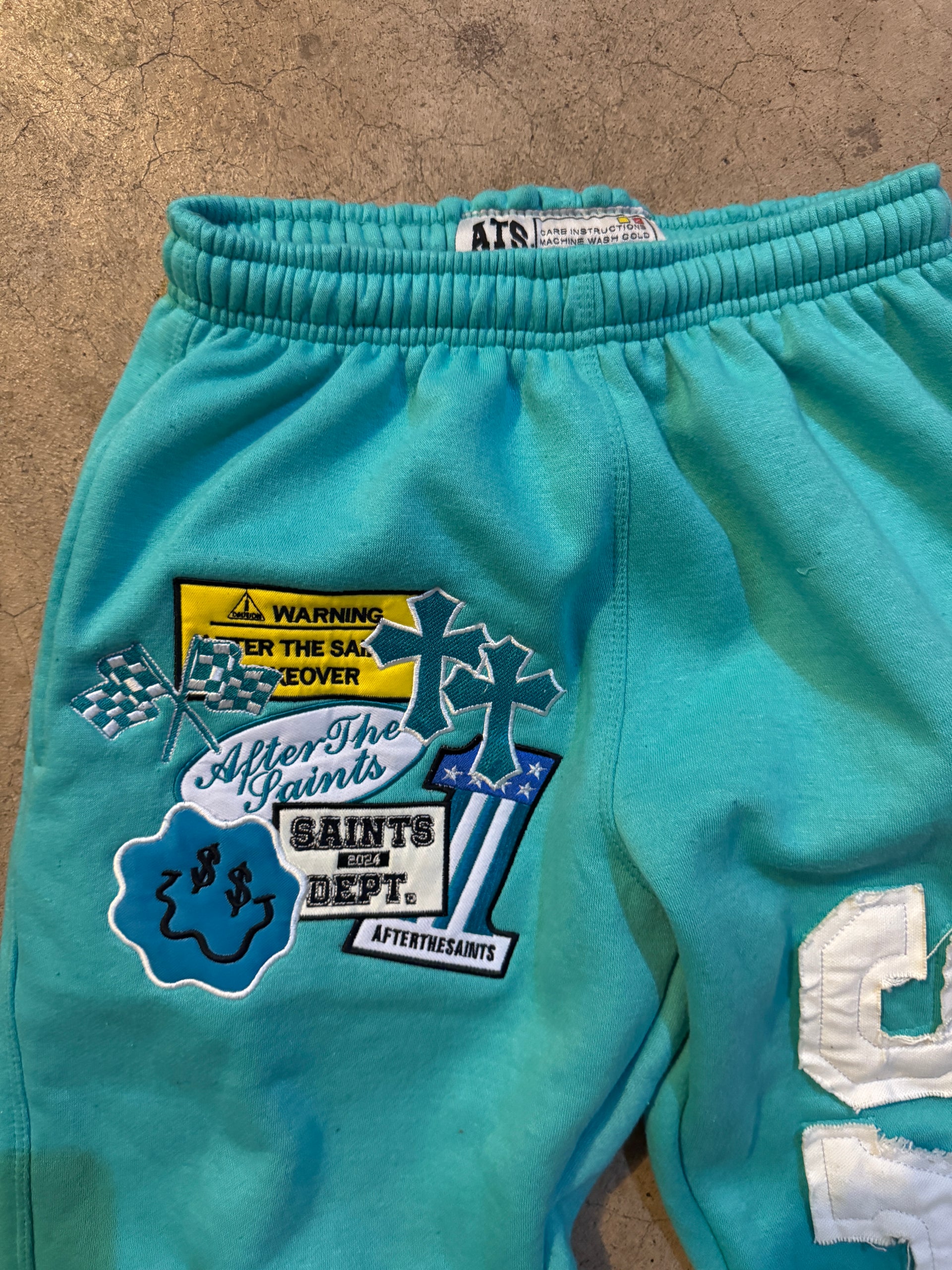 PATCHWORK TURQUOISE SWEATS