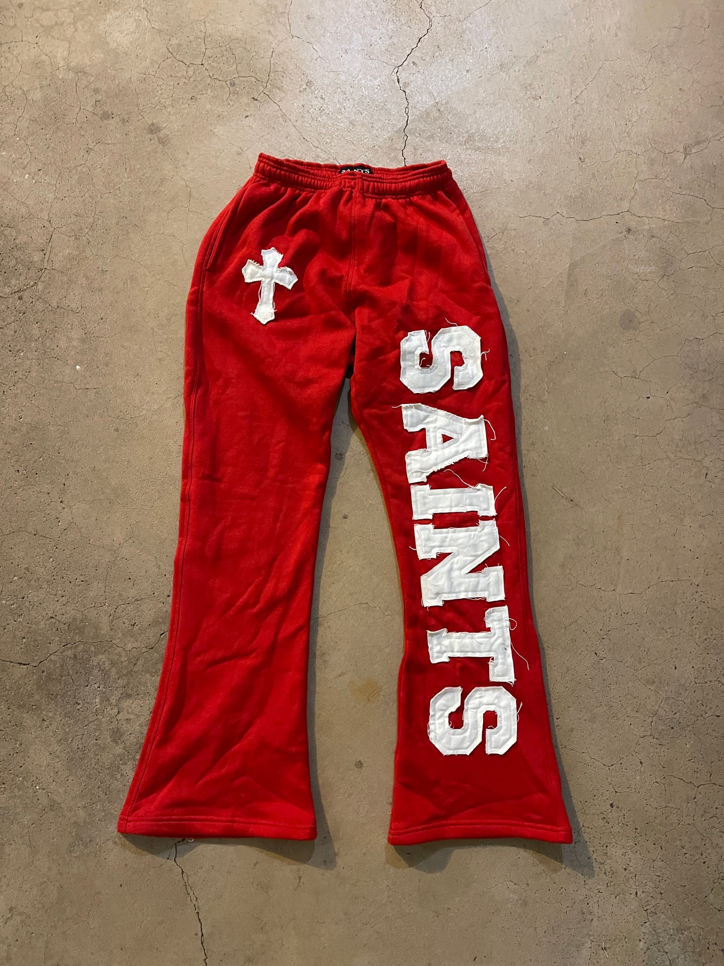 RED "SAINTS" FLARED SWEATS