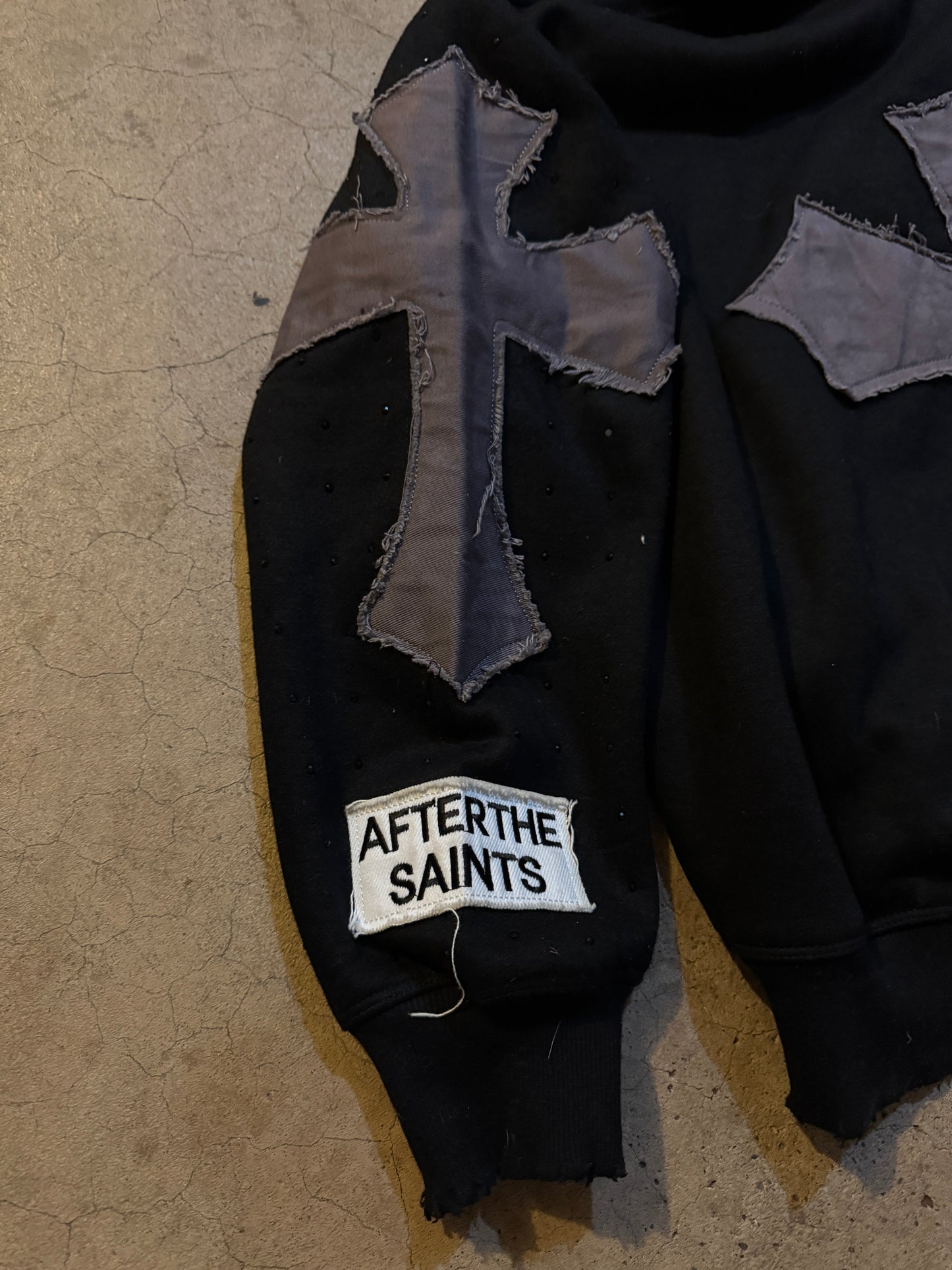 PATCHWORK BLACK SAINTS ZIP UP